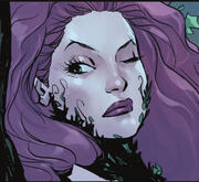 Picture of Poison Ivy (comic character). It is a picture of her face, she has one eye open.