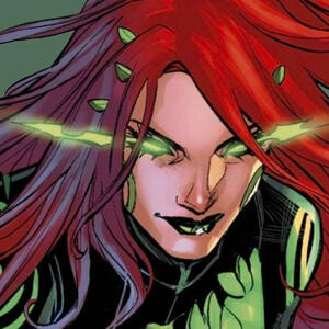 Picture of Poison Ivy (comic character). She's looking straight forward with glowing green eyes.